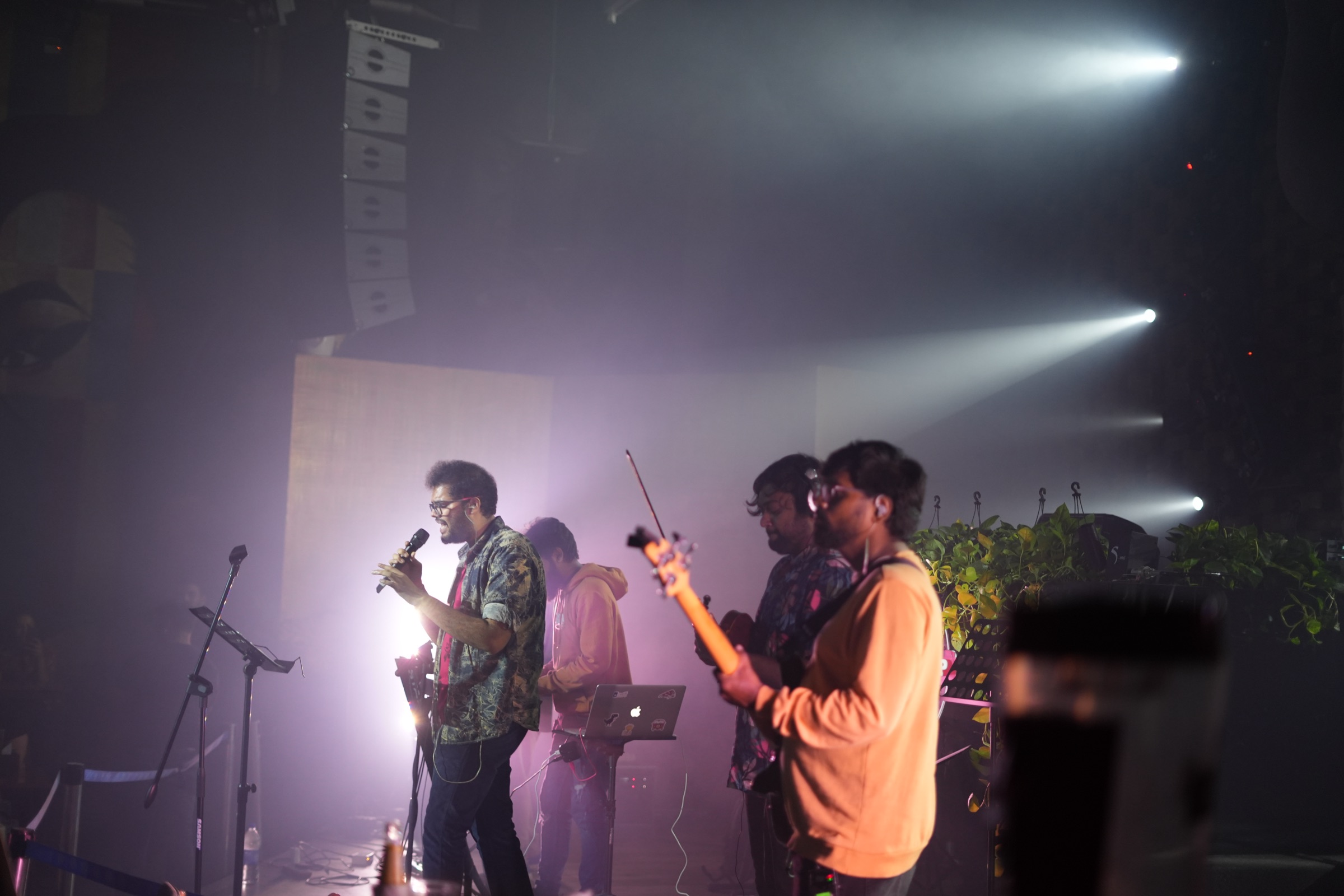 P V N S Rohit performing on stage with his band